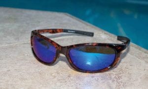 ocean waves sunglasses gold emblem on side